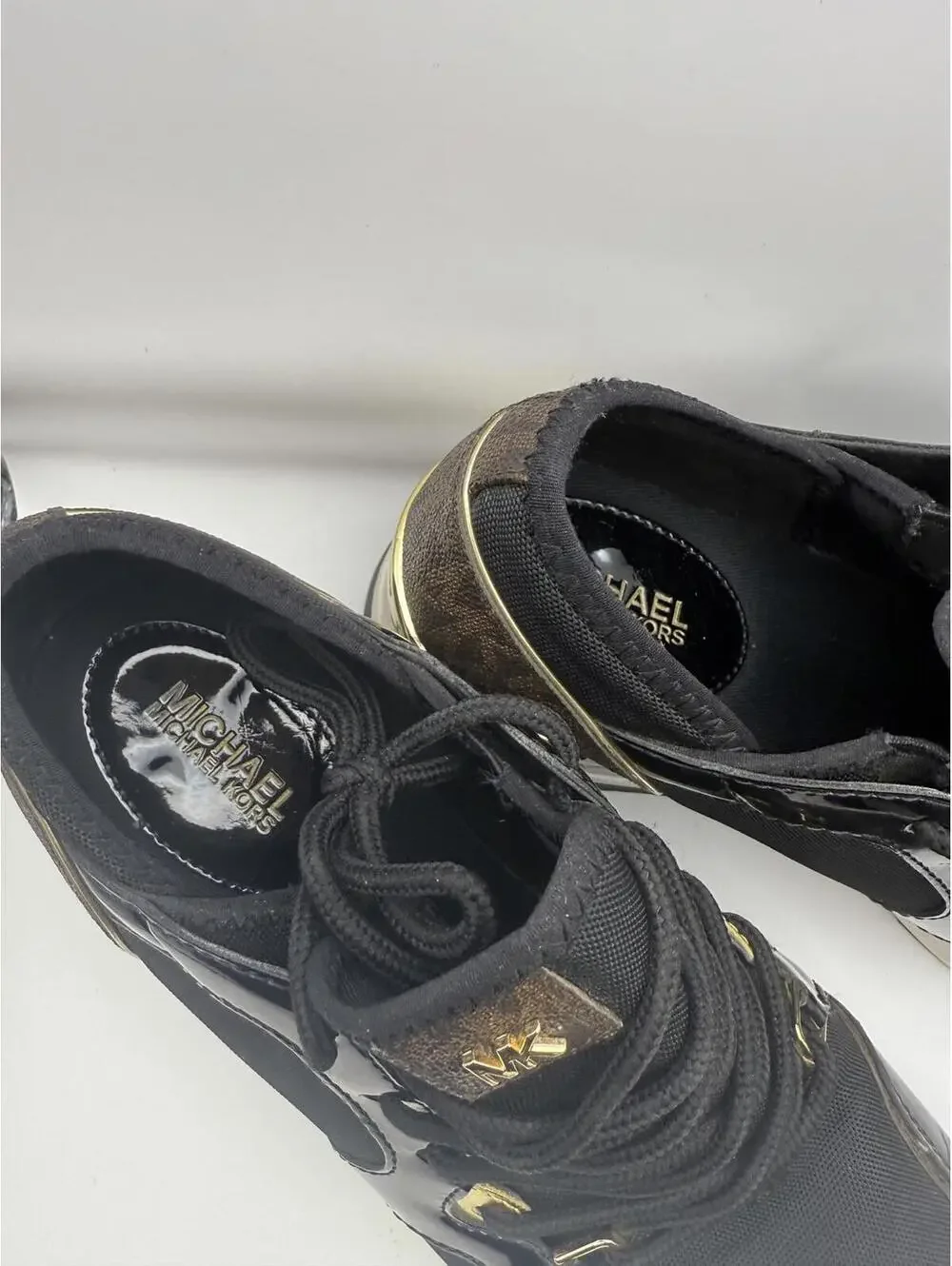 Michael Kors Women's Black and Gold Wedge Sneakers 8.5
